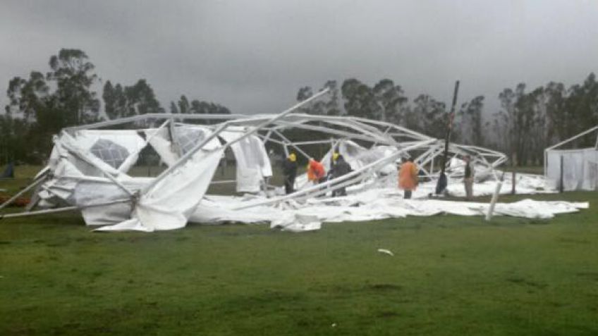 Lluvia, viento, suspensiones y destrozos